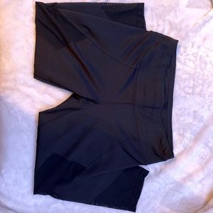 Athela capri black leggings with mesh cutouts